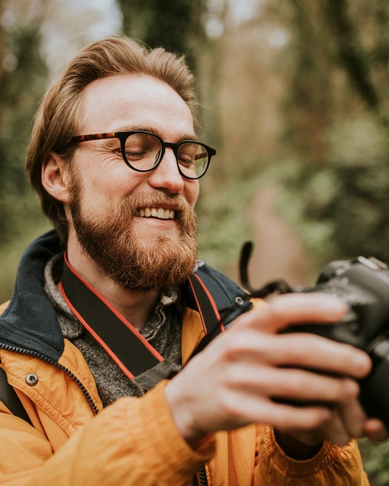 Freelance photographer reviewing shots